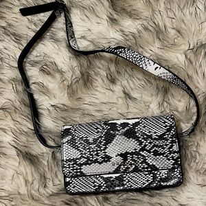Dknk Snakeskin Fanny pack only used once. Perfect condition.